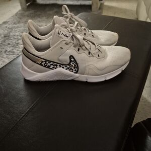 Nike Women's Light Beige Trainers with Leopard Swoosh